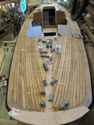 Get pro tips on Installing a Teak Boat Deck, with illustrations from Brooklin Boat Yard's construction of the 47′ sloop LARK.