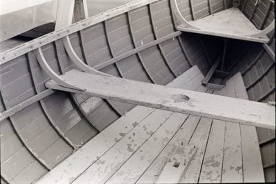 In a big open boat like this, floorboards can become so numerous that they’re almost like the ceiling of a larger vessel—strengthening it as well as protecting the frames and planking from damage.